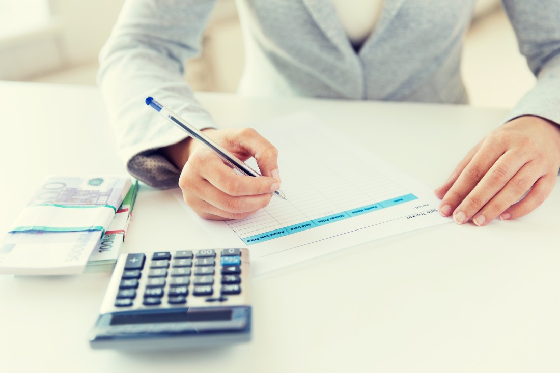 A woman working on Tax Benefits With Form 1098-T